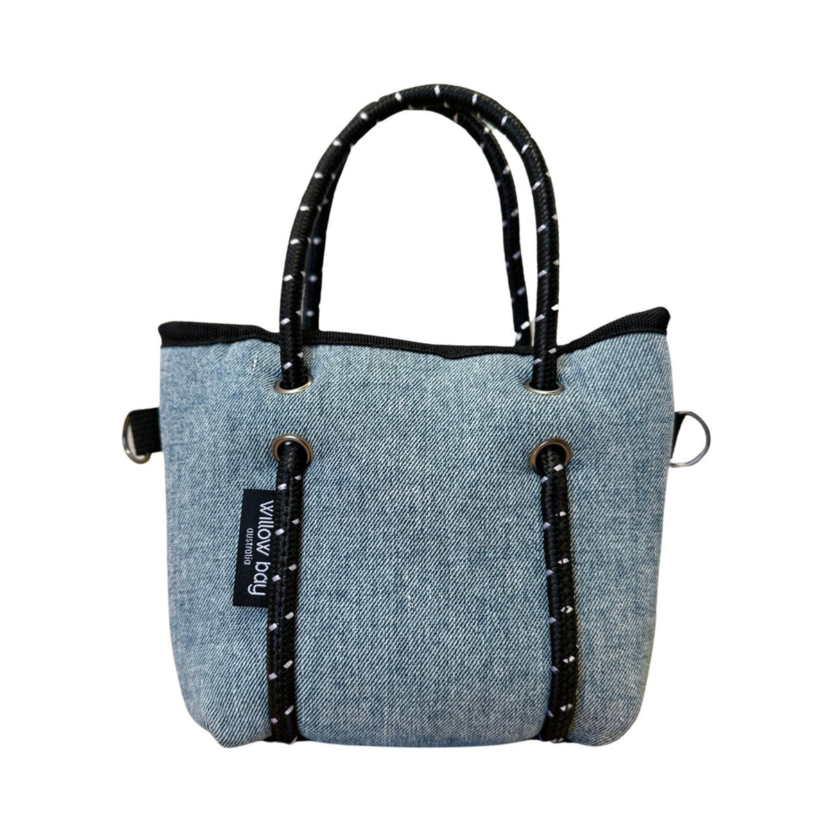 BOUTIQUE TINY Neoprene Tote Bag With Zip - BLUE DENIM-Willow Bay BOUTIQUE TINY Neoprene Tote Bag - Blue Denim The newest addition to the Boutique Family, meet the Tiny! This bag is seriously cool. The perfect companion when needing to store only your essentials. It will comfortably fit your phone, lippy, purse and keys and comes with a cool detachable crossbody strap so it can be used as a cute mini bag and/or a crossbody bag.
The Tiny has the same signature full closure zip as our Boutique and Boutique Mi