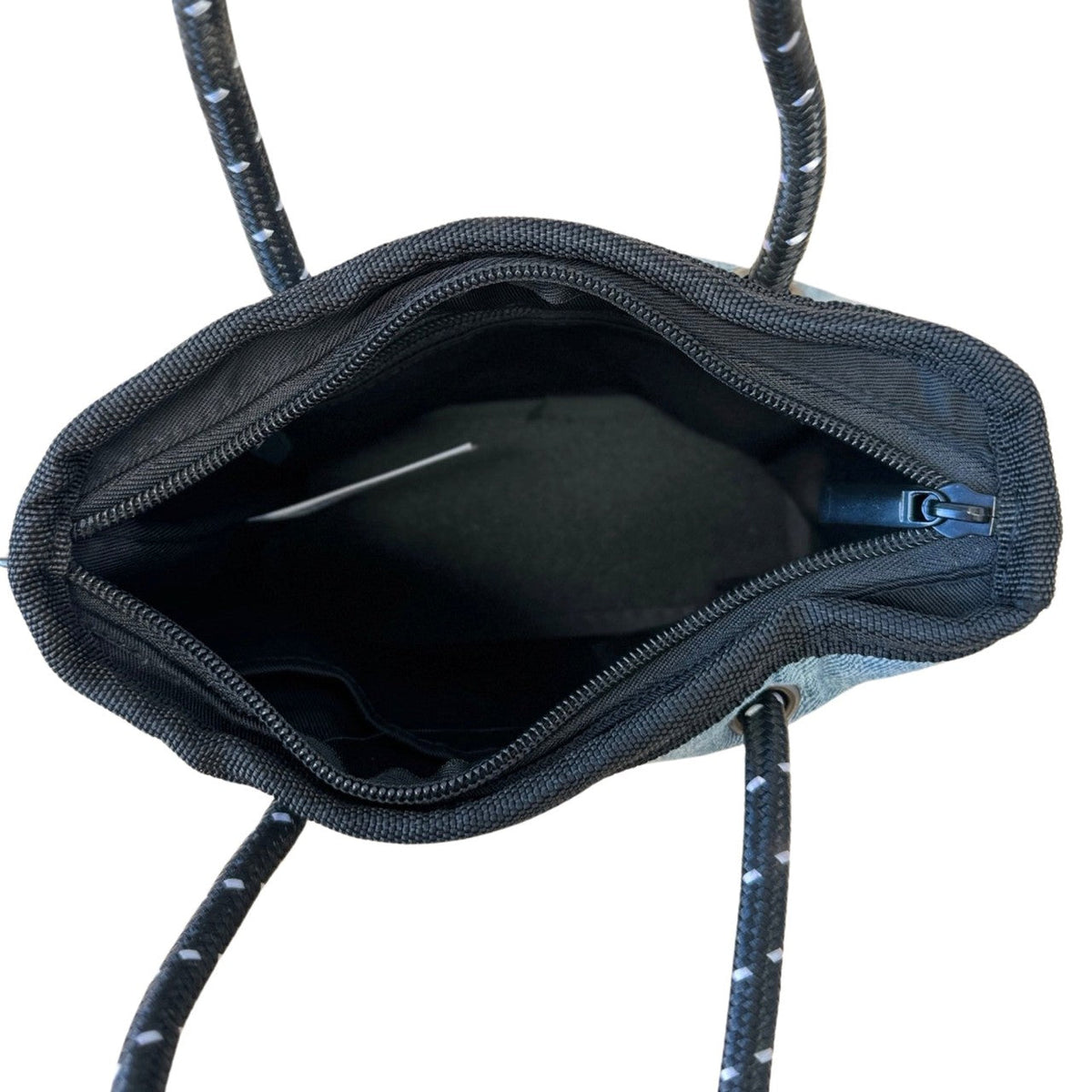 BOUTIQUE TINY Neoprene Tote Bag With Zip - BLUE DENIM-Willow Bay BOUTIQUE TINY Neoprene Tote Bag - Blue Denim The newest addition to the Boutique Family, meet the Tiny! This bag is seriously cool. The perfect companion when needing to store only your essentials. It will comfortably fit your phone, lippy, purse and keys and comes with a cool detachable crossbody strap so it can be used as a cute mini bag and/or a crossbody bag.
The Tiny has the same signature full closure zip as our Boutique and Boutique Mi