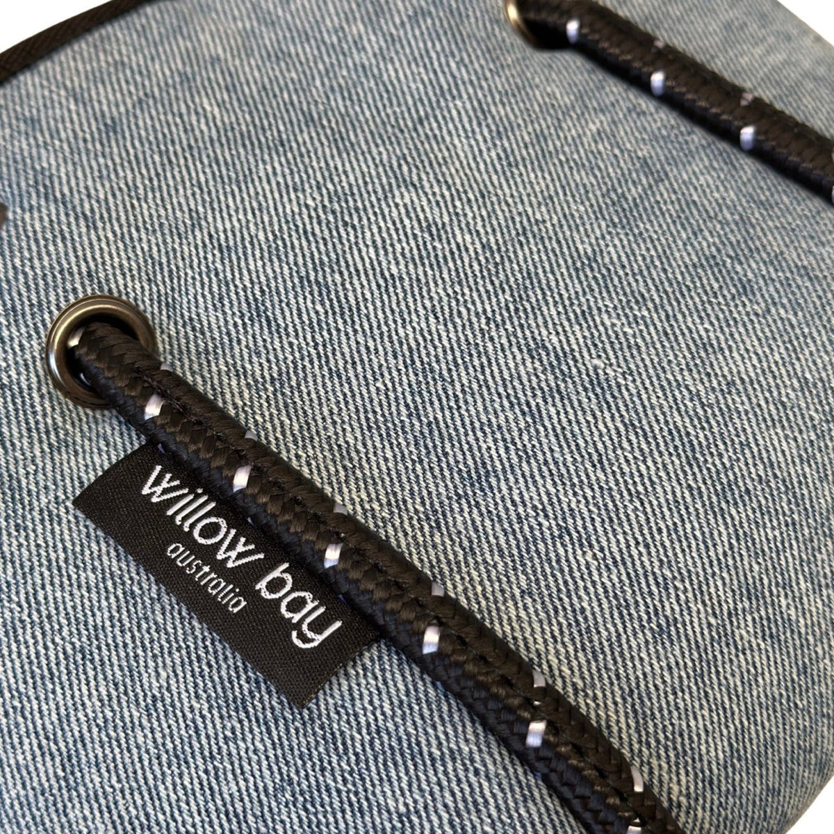 BOUTIQUE TINY Neoprene Tote Bag With Zip - BLUE DENIM-Willow Bay BOUTIQUE TINY Neoprene Tote Bag - Blue Denim The newest addition to the Boutique Family, meet the Tiny! This bag is seriously cool. The perfect companion when needing to store only your essentials. It will comfortably fit your phone, lippy, purse and keys and comes with a cool detachable crossbody strap so it can be used as a cute mini bag and/or a crossbody bag.
The Tiny has the same signature full closure zip as our Boutique and Boutique Mi