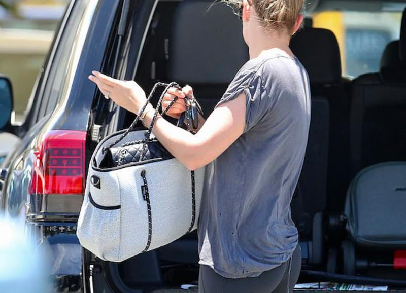 Daily Mail - Jasmine Yarbrough looks every inch the doting mother as she cradles her daughter Harper May, seven months, while shopping in Noosa with a friend - 16th December 2020