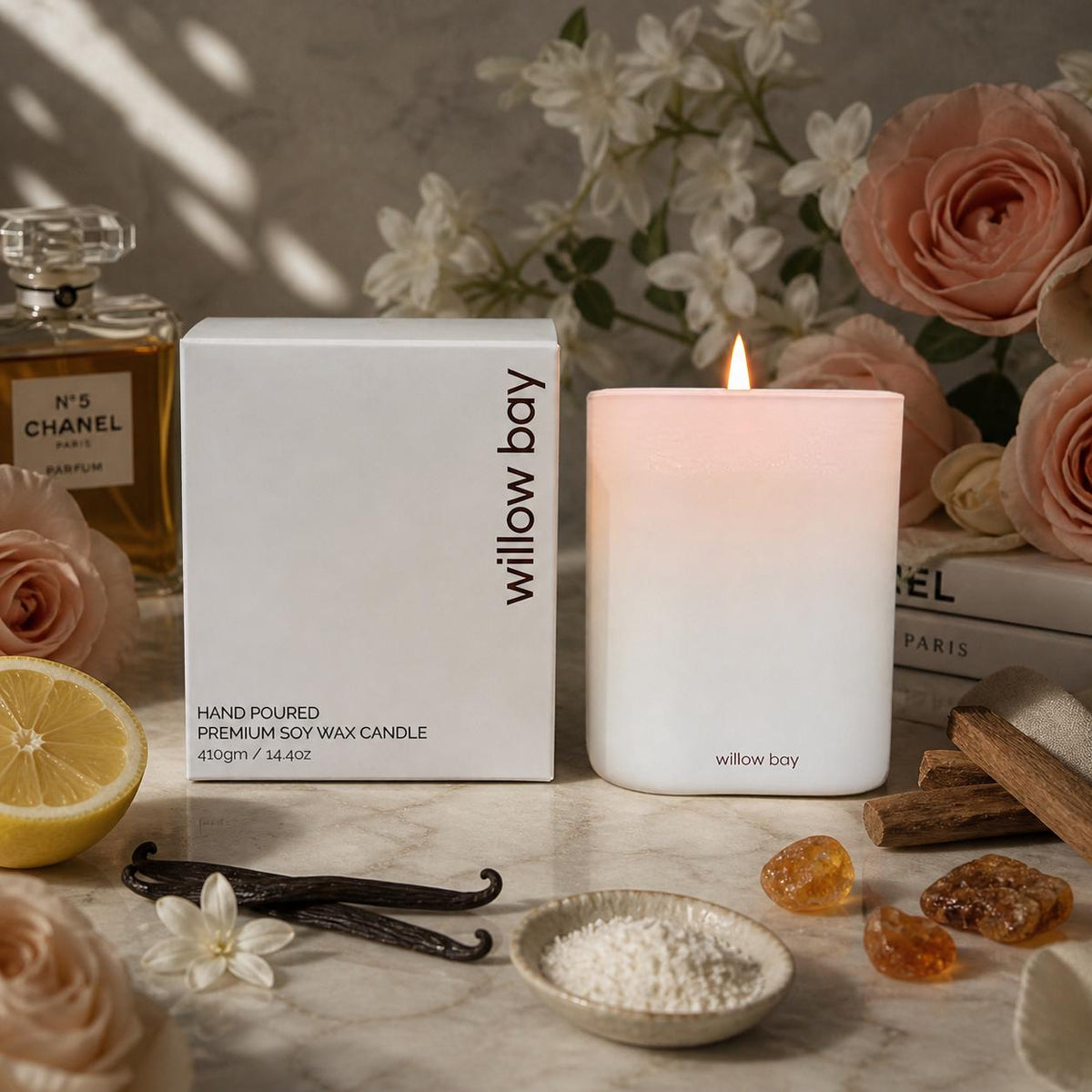 White matte frosted soy candle with box, lemon, vanilla, and flowers.